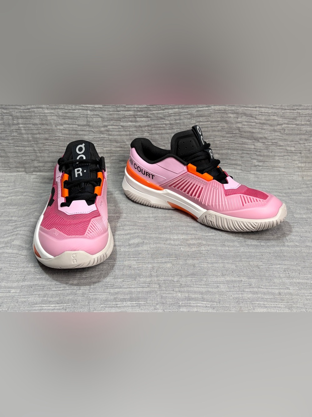 On Women’s The Roger Pro Fire tennis shoes